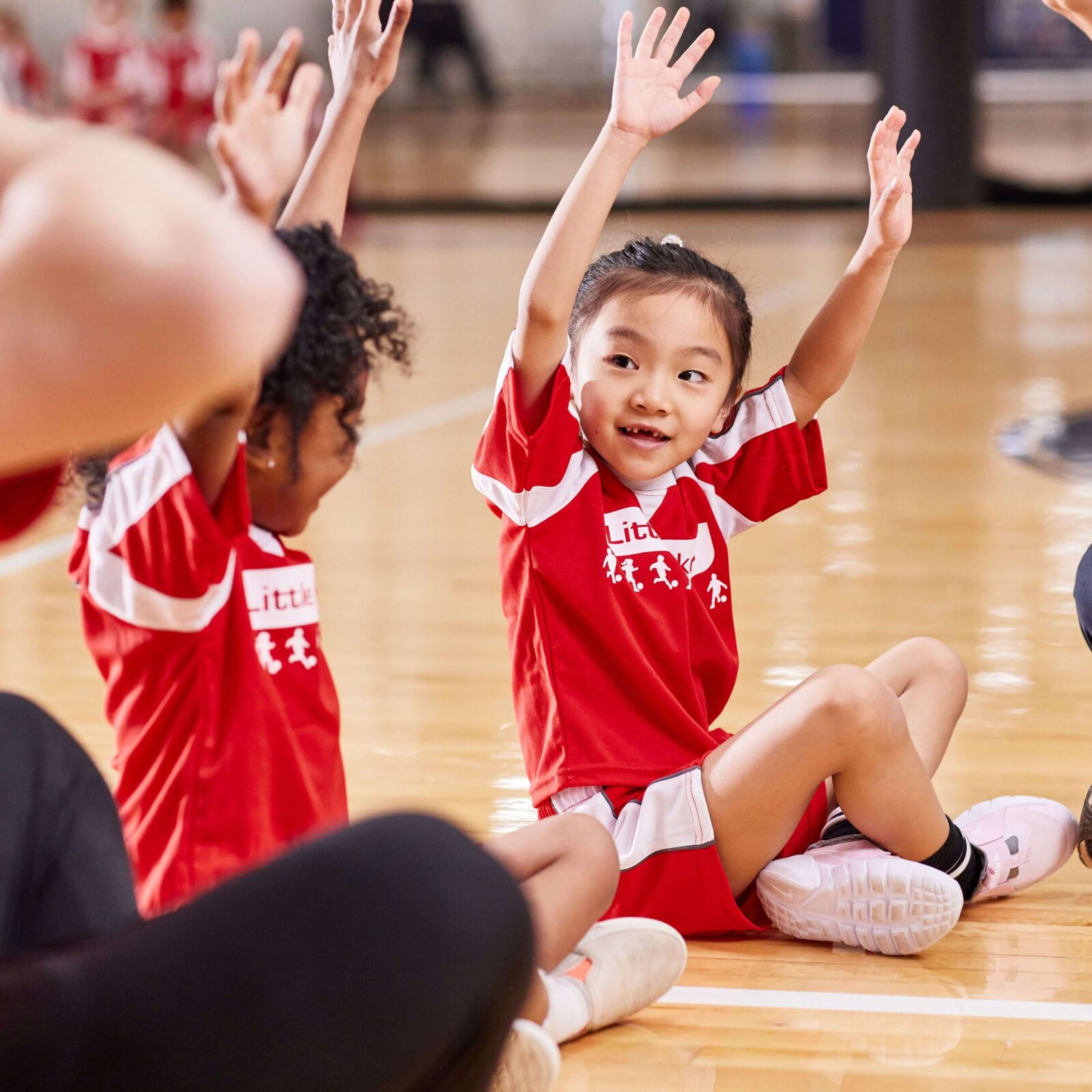 Children in circle wearing Little Jerseys