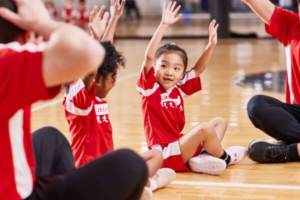 Children in circle wearing Little Jerseys